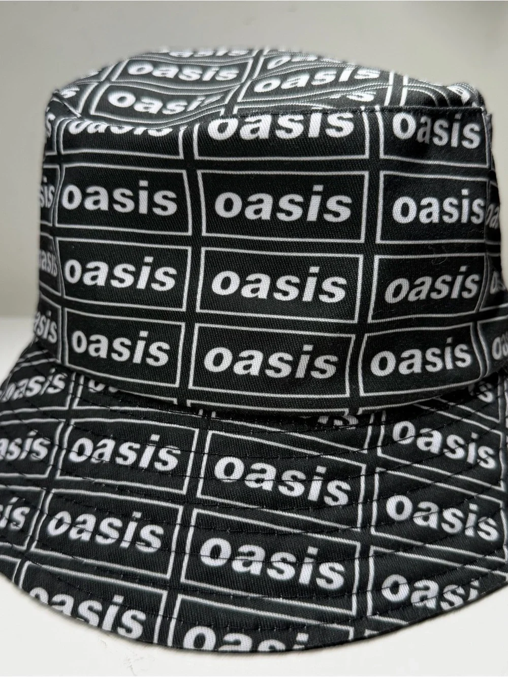 Oasis Live ‘25 reversible bucket hat official merchandise Liam Noel Gallagher